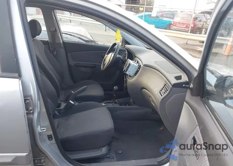 2010 Kia Rio Lx from USA, damaged, VIN KNADH4A33A6650267